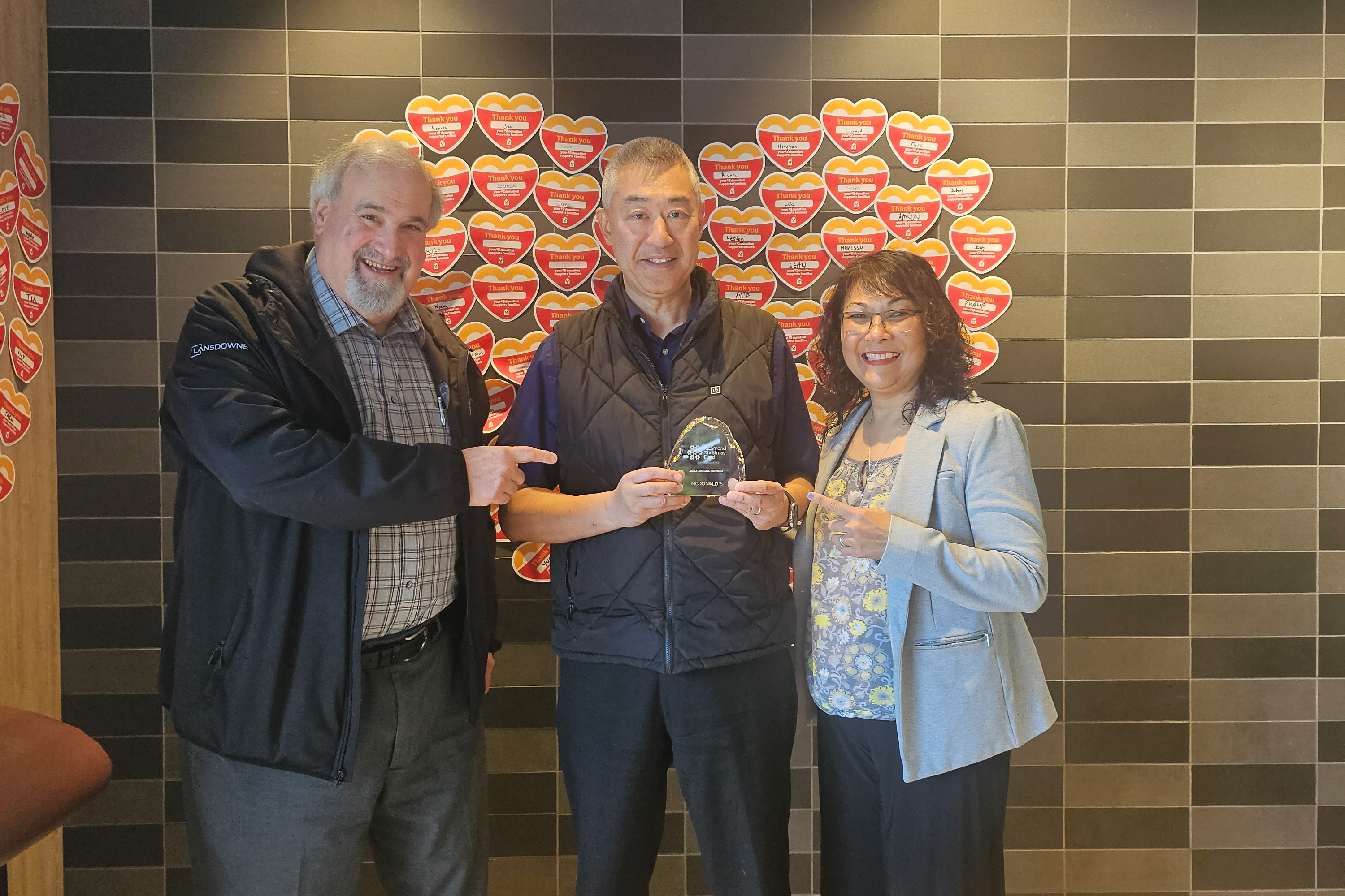 A recognition award being presented to Christmas Fund donors